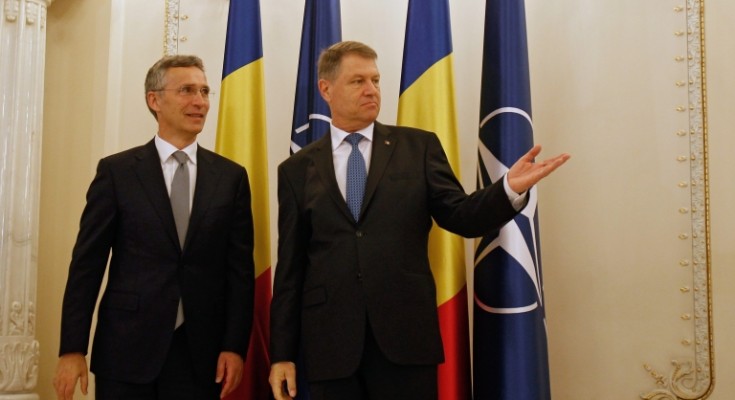 epa05300846 NATO Secretary General Jens Stoltenberg (L) is welcomed by Romania's President Klaus Iohannis at Cotroceni presidential palace in Bucharest, Romania, 12 May 2016. Stoltenberg is in Romania to inaugurate the antimissile defense system Aegis Ashore at the Deveselu military base, part of the US anti-missile shield that will be an integrated part of NATOs anti-ballistic defense system.  EPA/BOGDAN CRISTEL