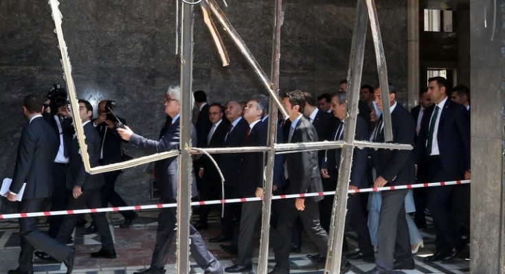 epa05431813 Turkish Prime Minister Binali Yildirim (C) visits a destroyed part of the Turkish Parliament in Ankara, Turkey, 19 July 2016. Turkish Prime Minister Yildirim reportedly said that the Turkish military was involved in an attempted coup d'etat. Turkish President Recep Tayyip Erdogan has denounced the coup attempt as an 'act of treason' and insisted his government remains in charge. Some 104 coup plotters were killed, 90 people - 41 of them police and 47 are civilians - 'fell martrys', after an attempt to bring down the Turkish government, the acting army chief General Umit Dundar said in a televised appearance.who were killed in a coup attempt on 16 July, during the funeral, in Istanbul, Turkey, 17 July 2016. Turkish Prime Minister Yildirim reportedly said that the Turkish military was involved in an attempted coup d'etat. Turkish President Recep Tayyip Erdogan has denounced the coup attempt as an 'act of treason' and insisted his government remains in charge. Some 104 coup plotters were killed, 90 people - 41 of them police and 47 are civilians - 'fell martrys', after an attempt to bring down the Turkish government, the acting army chief General Umit Dundar said in a televised appearance.  EPA/STR