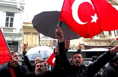 epa05844021 Supporters of Turkish President Recep Tayyip Erdogan shout slogans against Netherlands during a protest in front of Netherlands Consulate, in Istanbul, Turkey 12 March 2017. Turkish Family Minister Fatma Betul Sayan Kaya was barred by police from entering the Turkish consulate in Rotterdam on 11 March, after the Dutch government had denied landing rights to Turkish Foreign Minister Cavusoglu who planned a speech at the consul's residence in Rotterdam. The incidents have led to a diplomatic row between the two countries, and protests by Turkish citizens in the Netherlands as well as in Turkey.  EPA/TOLGA BOZOGLU