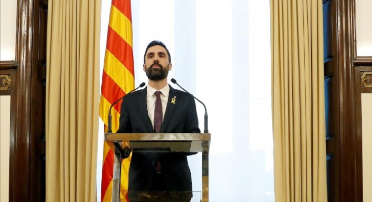 epa06485073 The Speaker of the Catalan Parliament, Roger Torrent, announces that the investiture debate has been postponed, in Barcelona, Spain, 30 January 2018. According to Torrent, 'he will not propose any other candidate but Carles Puigdemont', which is the reason why he has decided to postpone the investiture in order to give time for the Constitutional Court to study Puigdemont's request to be elected President abroad. The Constitutional Court announced on 27 January that Catalonia's fugitive former President Carles Puigdemont must return to Spain if he wants to be elected in the investiture debate, as a preventive turn out to avoid the Catalan Parliament from electing him without being present at the Chamber. The Court also recalled that Puigdemont would need a judicial permission, despite his presence at the Chamber, as there is still a warrant order in force.  EPA/ANDREU DALMAU