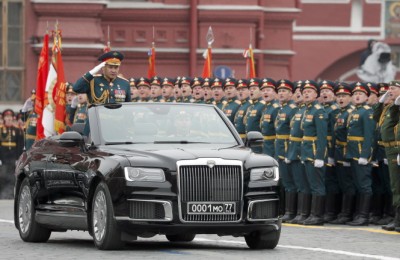 epa07557113 Russian Defense Minister Sergei Shoigu salutes participants from a new limousine Aurus during Victory Day parade in Red Square in Moscow, Russia, 09 May 2019. Russia marks 09 May the 74th anniversary of the victory in the World War II over Nazi Germany and its allies. The Soviet Union lost 27 million people in the war.  EPA/YURI KOCHETKOV