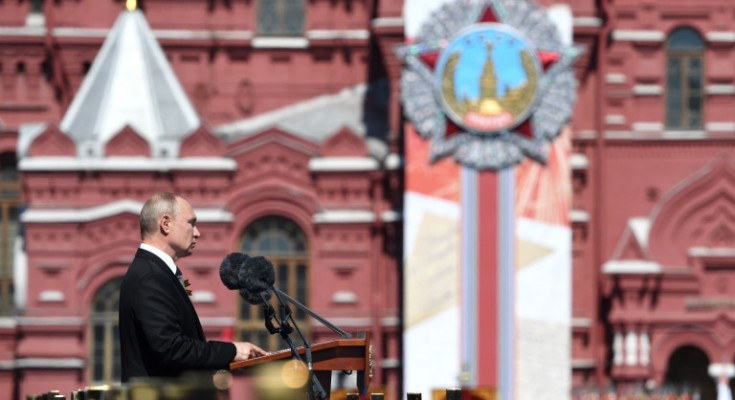 epa08505291 Russian President and Commander-in-Chief of the Russian Armed Forces Vladimir Putin delivers a speech during a military parade, marking the 75th anniversary of the Nazi defeat, in Moscow, Russia, 24 June 2020. The Victory Day military parade normally is held on 09 May, the nation's most important secular holiday, but this year it was postponed due to the coronavirus pandemic.  EPA/SERGEY PYATAKOV / POOL MANDATORY CREDIT: HOST PHOTO AGENCY