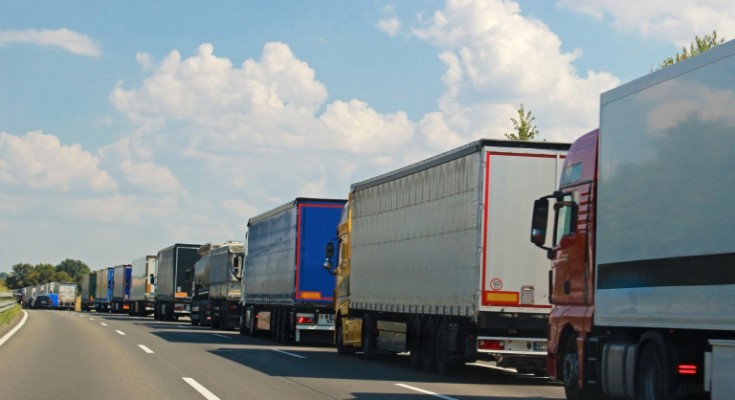 long row of trucks on a German highway
