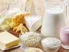Various fresh dairy products on wooden background